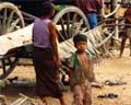 cambodia - kid and "truck" in the jungle
